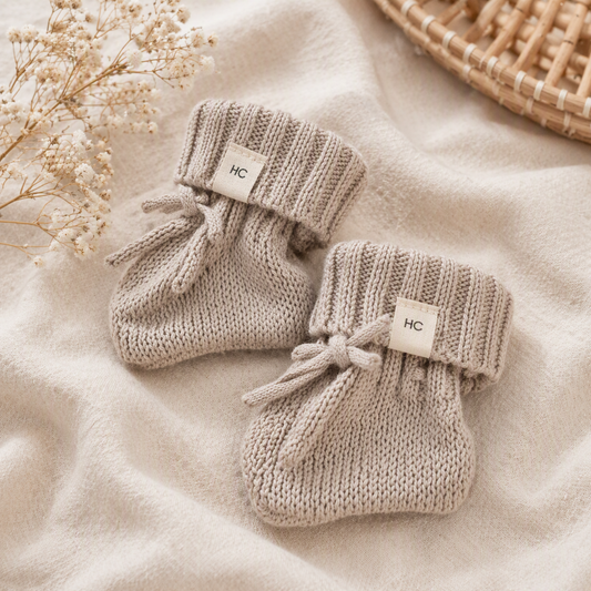Earthy Taupe organic cotton newborn booties, soft knitted baby booties for 0–3 months by Harper Clare.
