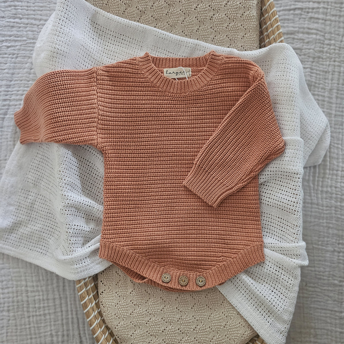 Dusty Clay organic cotton newborn romper, soft knitted baby outfit for 0–3 months by Harper Clare.