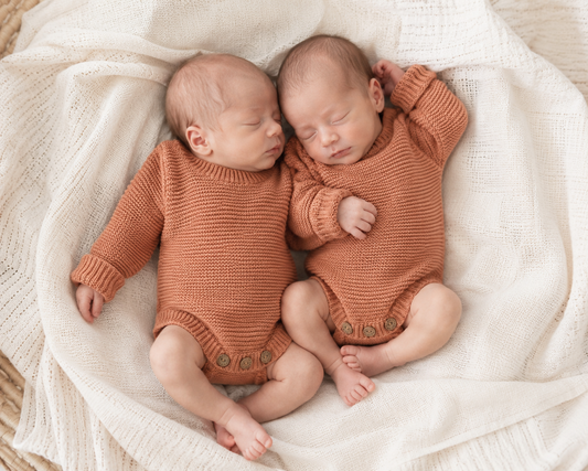 Dusty Clay organic cotton newborn romper, soft knitted baby outfit for 0–3 months by Harper Clare.